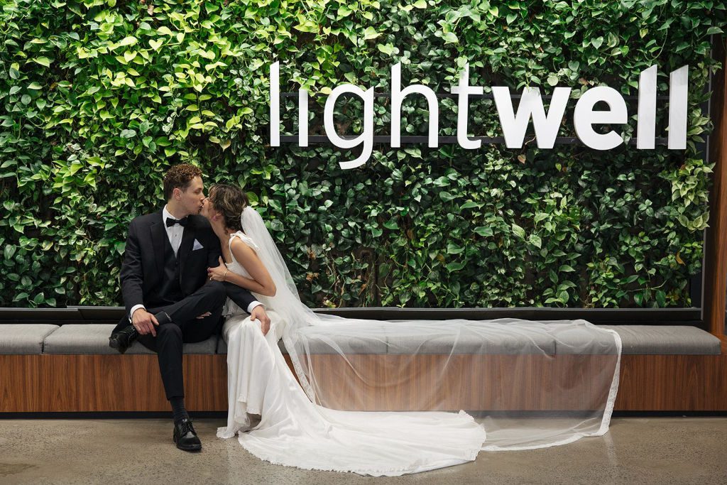 weddings-header-banner-01 image of a bride and groom on the roof at lightwell kansas city